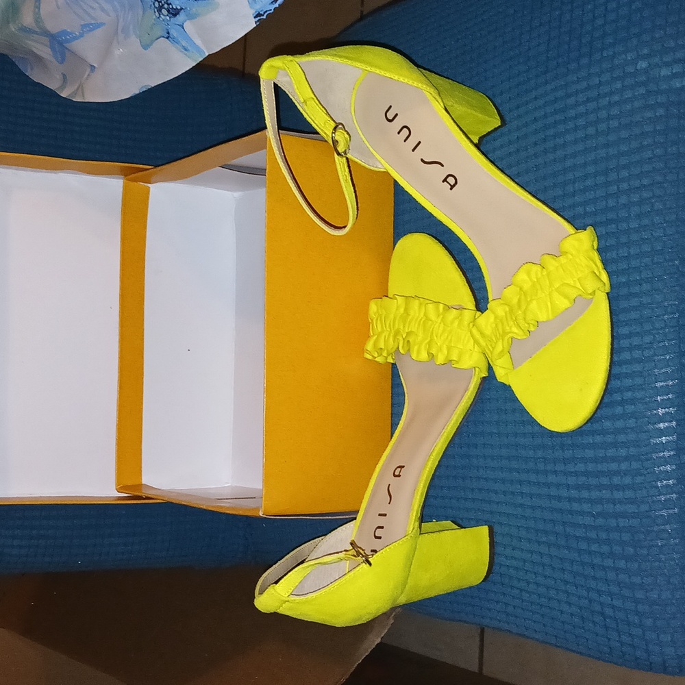 Multi fabric yellow heels.